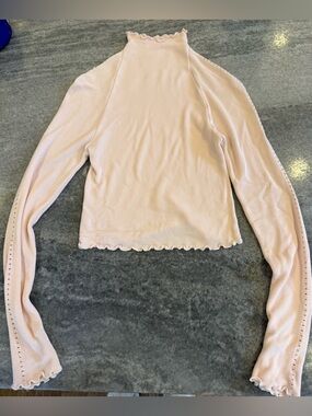 Free People Movement Lettuce-Edge Mock Neck Long Sleeve Top in Pale Pink
